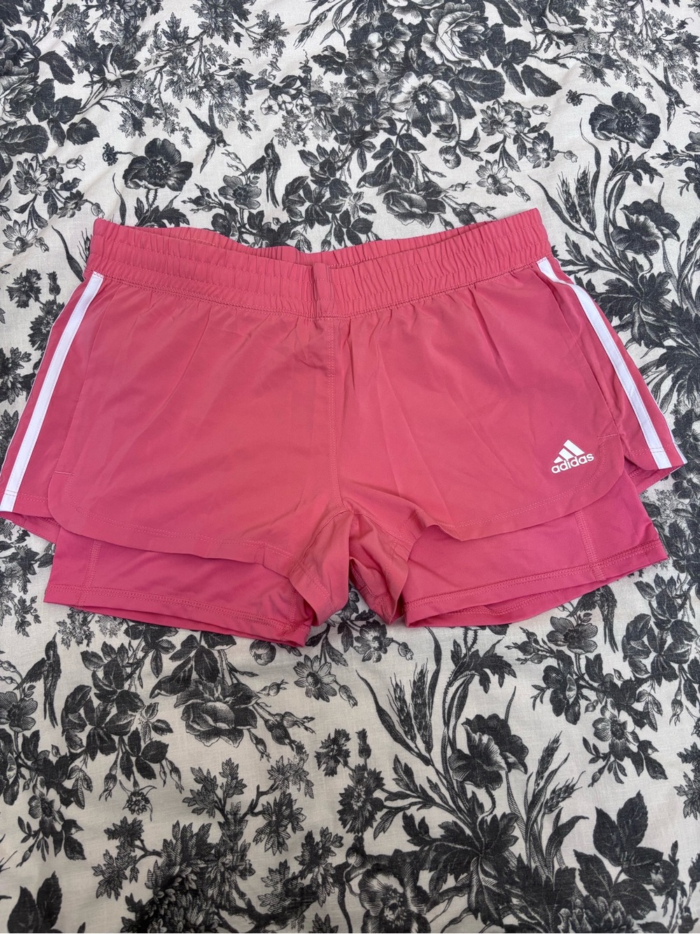 Adidas Women's Pink Athletic Shorts with White Stripes